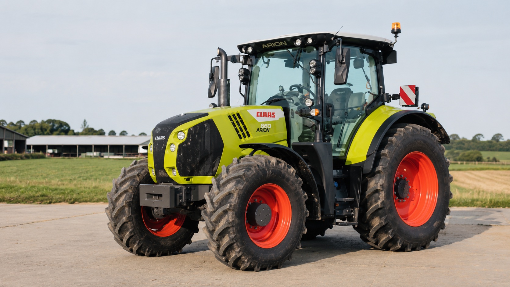 Tracteur CLAAS ARION 660 présenté dans un environnement agricole