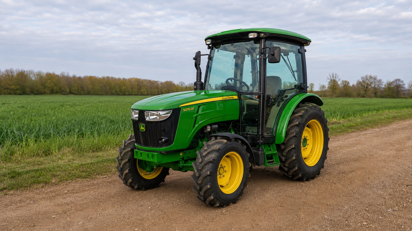 Tracteur John Deere 5075GF présenté dans un environnement agricole