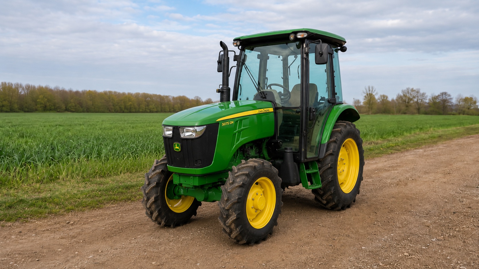 Tracteur John Deere 5075GN présenté dans un environnement agricole