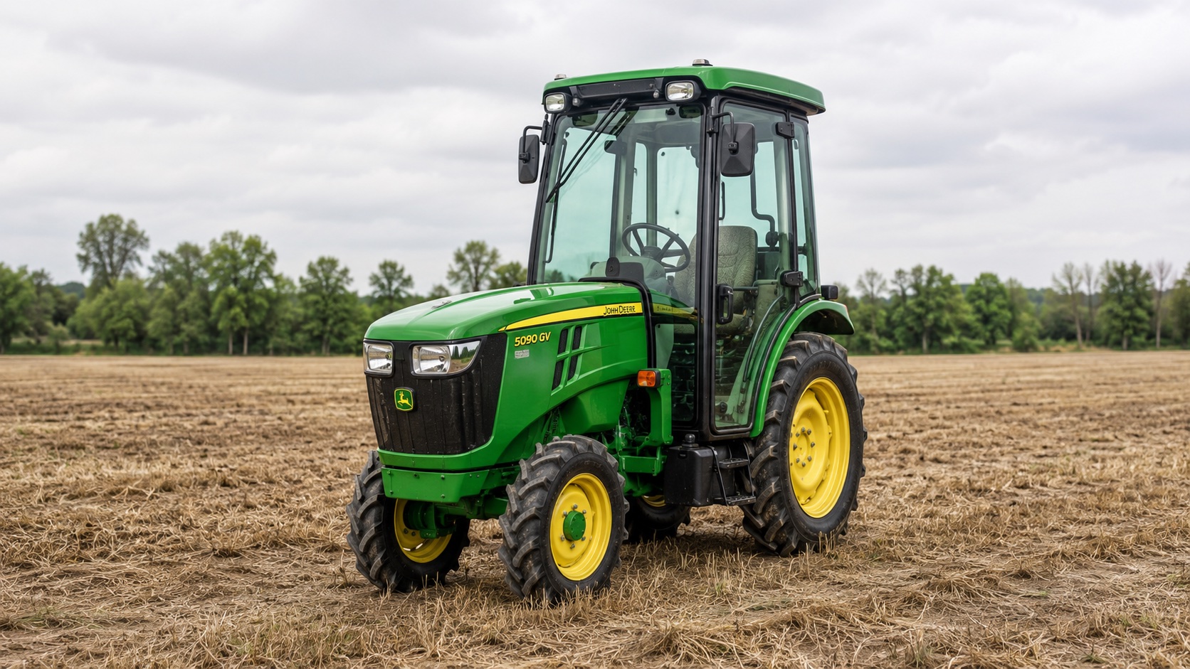 Tracteur John Deere 5090G présenté dans un environnement agricole