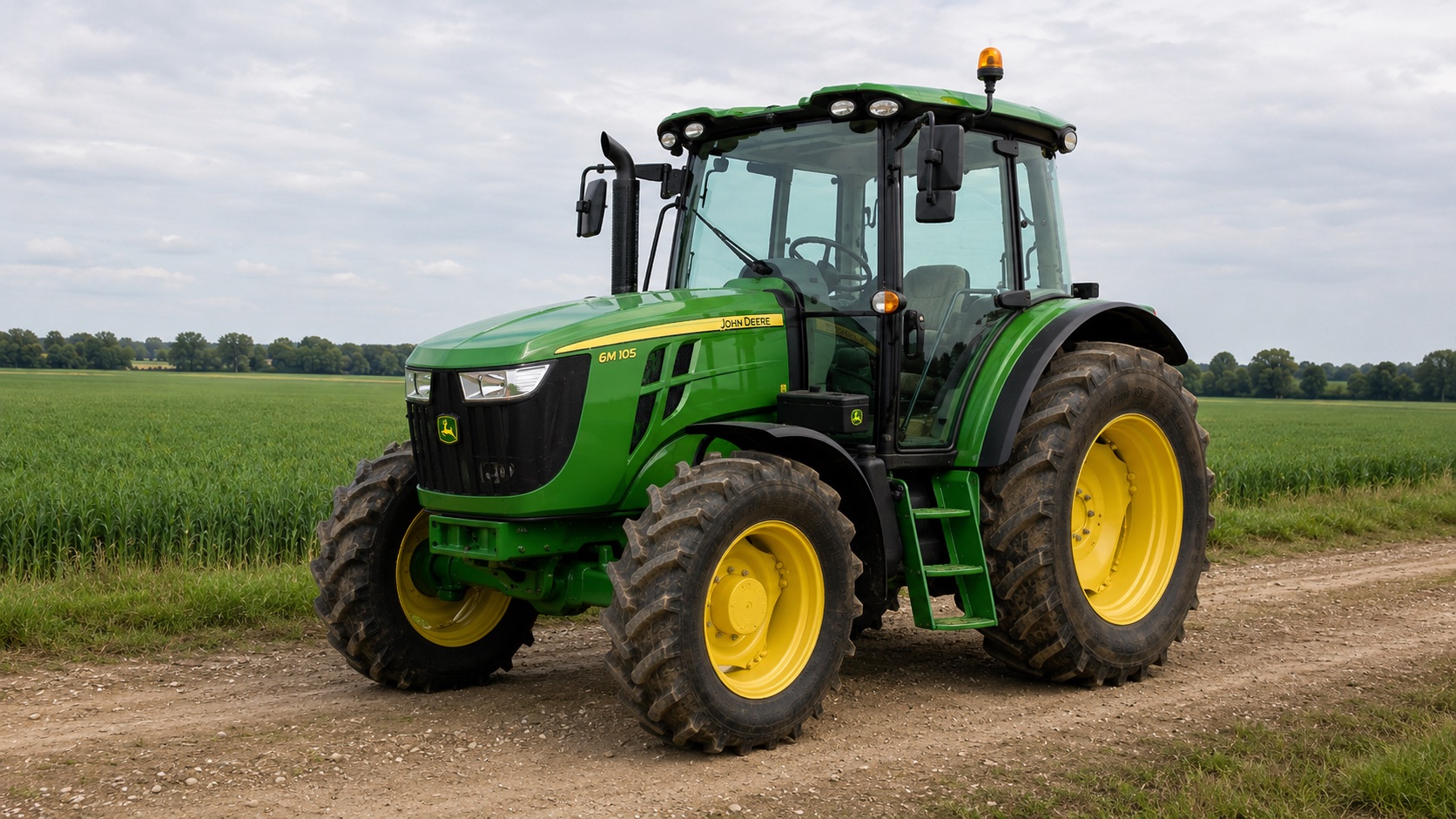 Tracteur John Deere 6M 105 présenté dans un environnement agricole