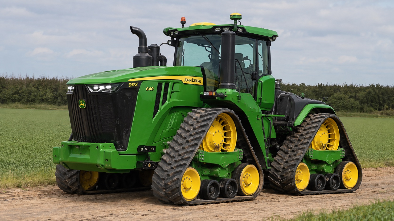 Tracteur John Deere 9RX 640 présenté dans un environnement agricole