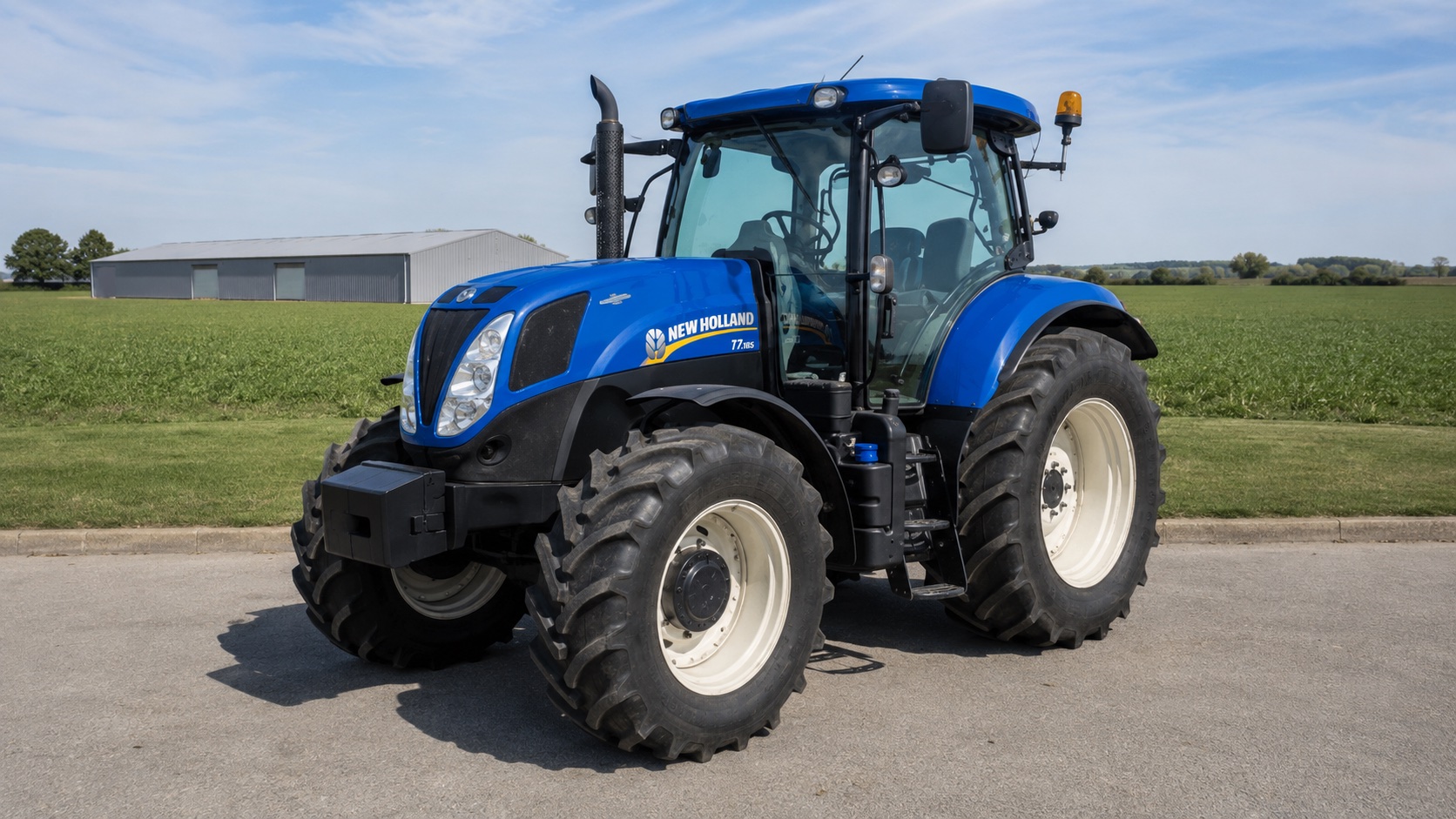 Tracteur New Holland T7.185 présenté dans un environnement agricole