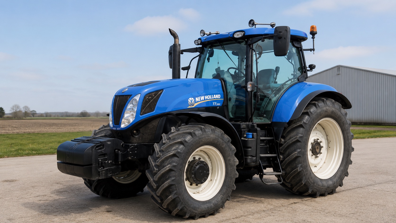 Tracteur New Holland T7.220 présenté dans un environnement agricole